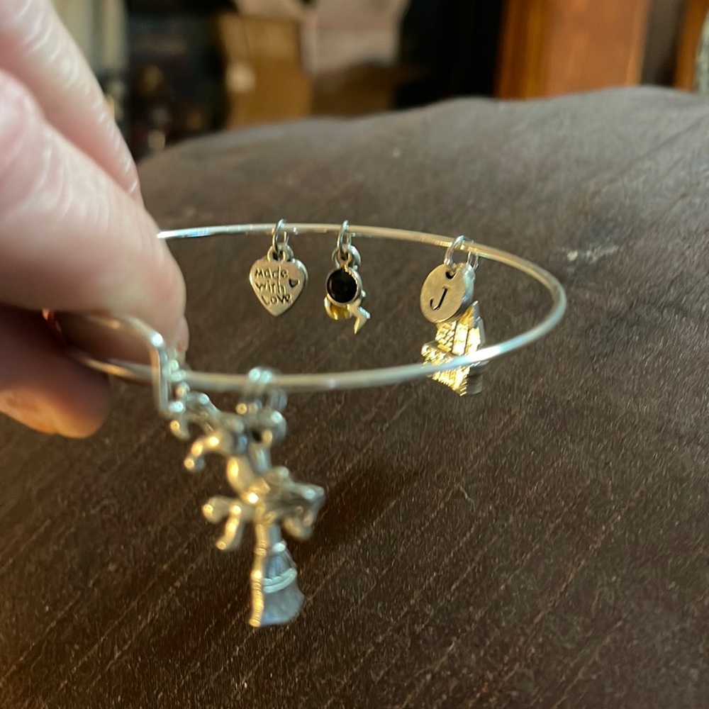 Super cute and stylish silver charm bracelet handmade in the USA. Adjustable